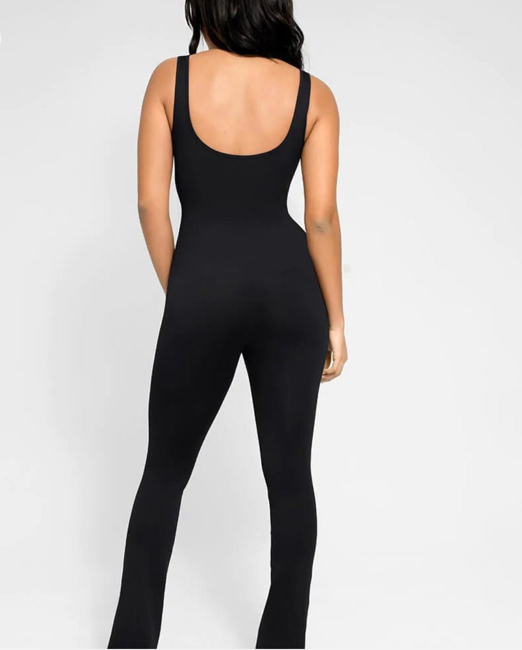 Black Seamless Snatching Flare Jumpsuit   - Veronica Luxe